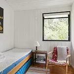 Vakantiehuis The Red Summer House With The Lush Garden At