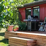 The Red Summer House With The Lush Garden At Vakantiehuis